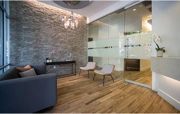 Waiting room area with couch and chairs